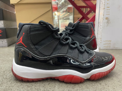 PRE OWNED Jordan 11 Retro Playoffs Bred (2019)