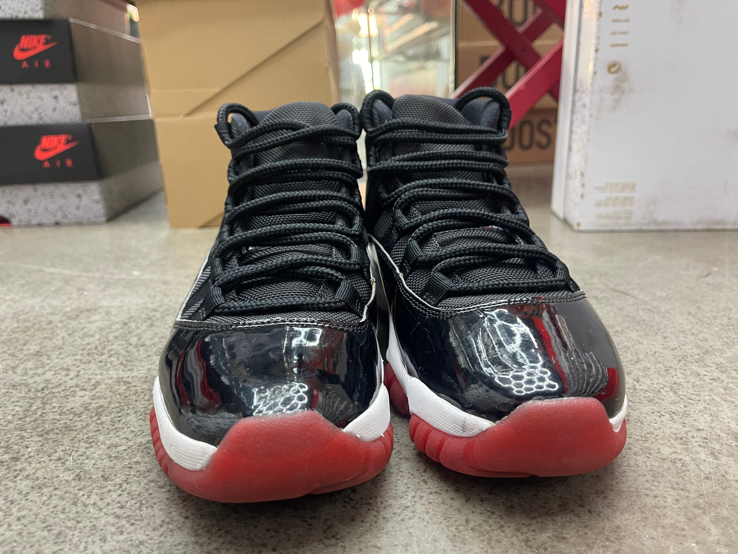 PRE OWNED Jordan 11 Retro Playoffs Bred (2019)