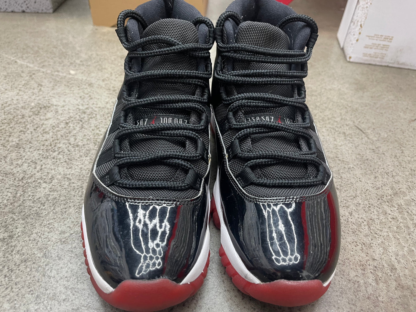 PRE OWNED Jordan 11 Retro Playoffs Bred (2019)