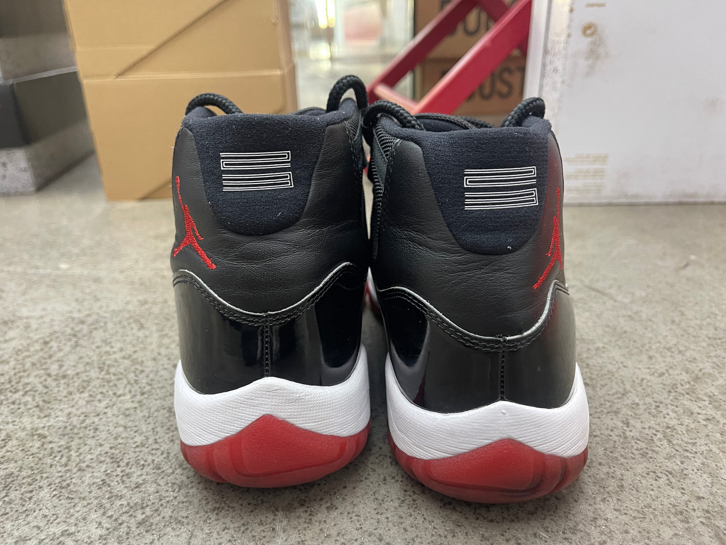 PRE OWNED Jordan 11 Retro Playoffs Bred (2019)